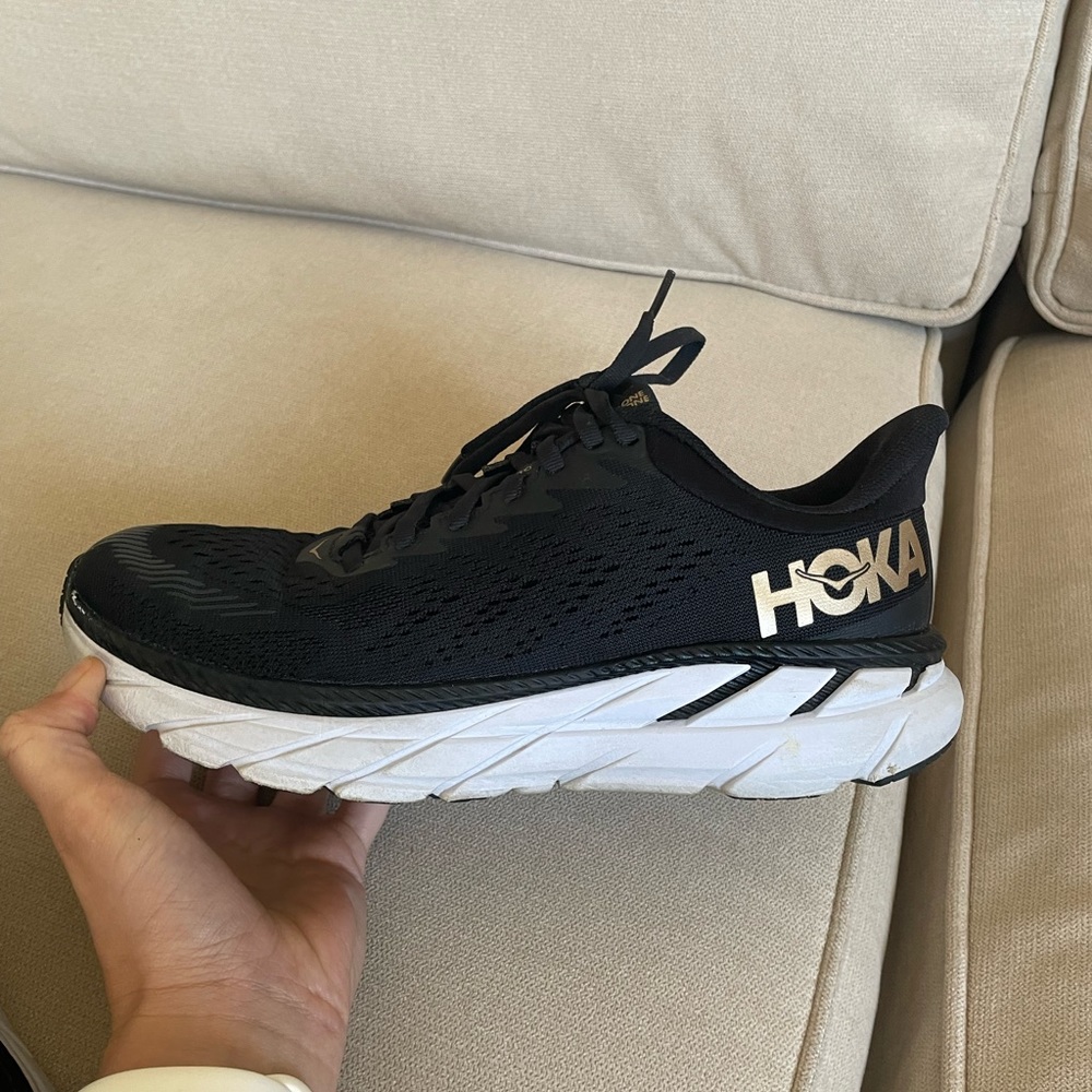Black and Gold Hoka Clifton 7